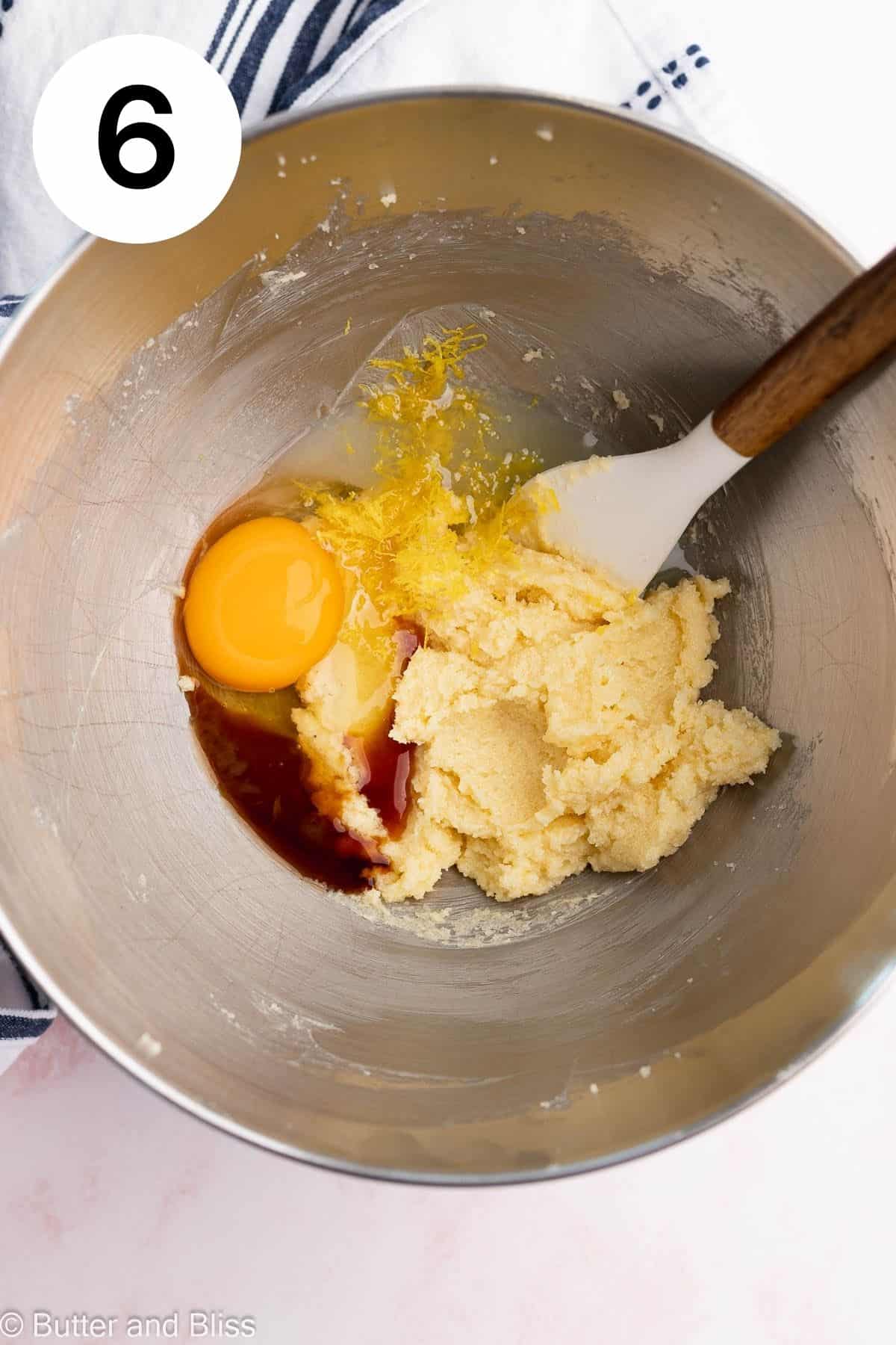 Wet ingredients being combined in a mixing bowl.