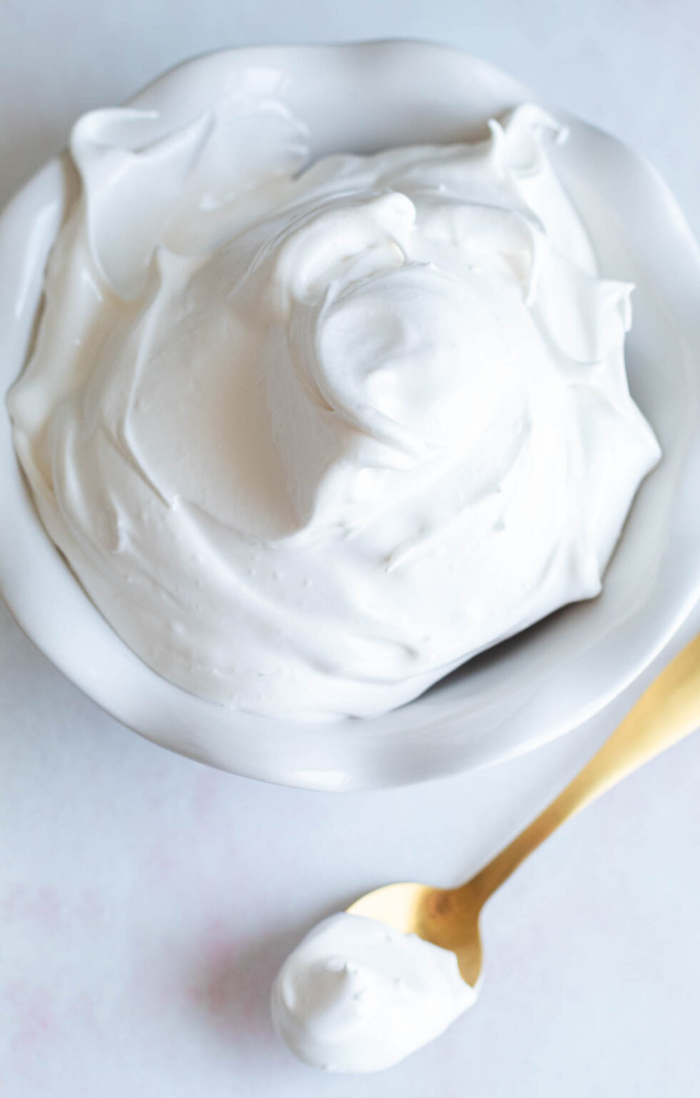 Glossy Marshmallow Meringue Frosting - Butter and Bliss