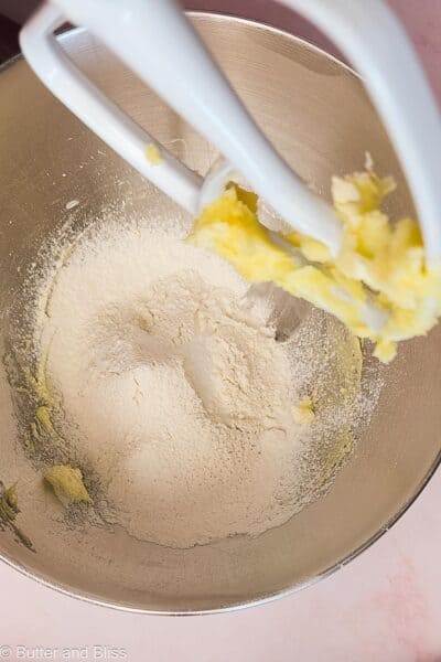 Flour added to creamed butter and sugar.