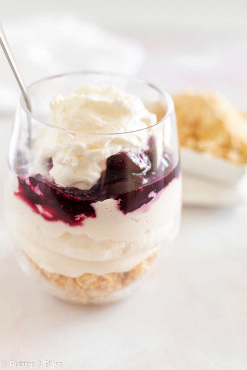Parfait glass of smooth no bake cheesecake