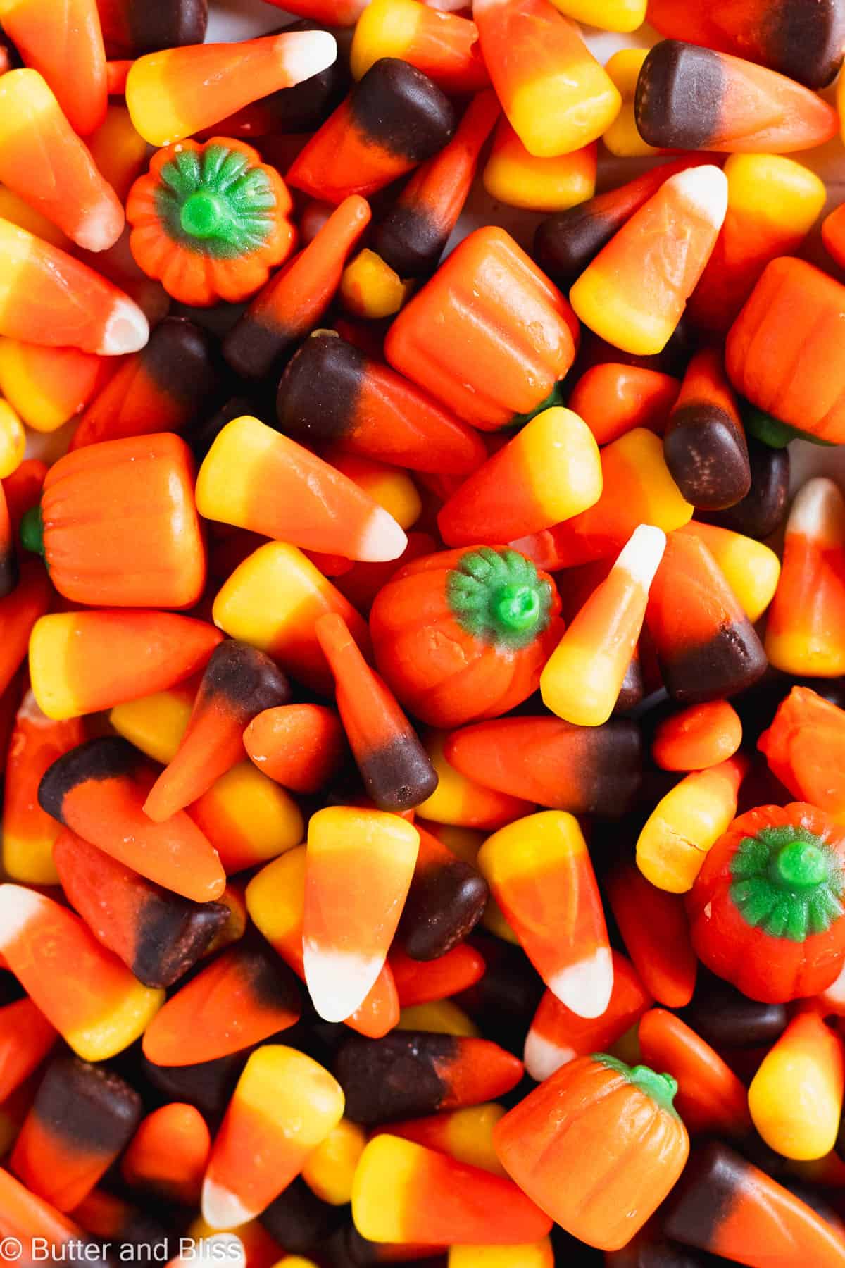 Table full of candy corn candies.