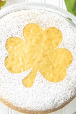 A pretty irish tea cake decorated with a powdered sugar shamrock.