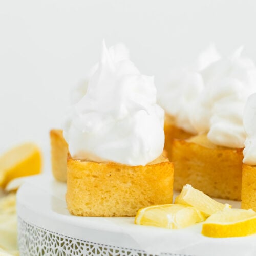 Frosted lemon cakes on a cake stand