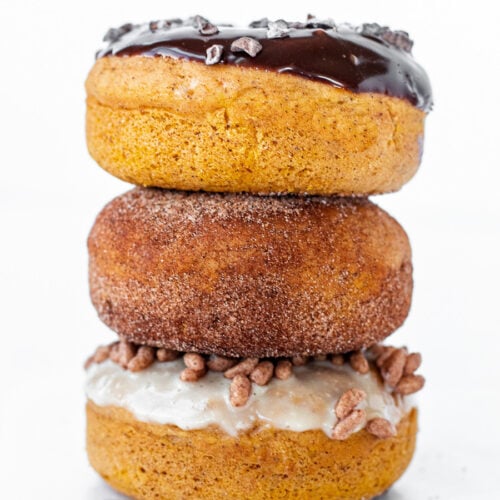 Baked pumpkin donuts stacked