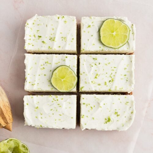 Batch of key lime bars cut into squares on a table