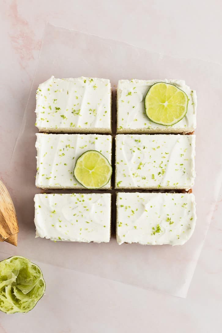 Batch of key lime bars cut into squares on a table