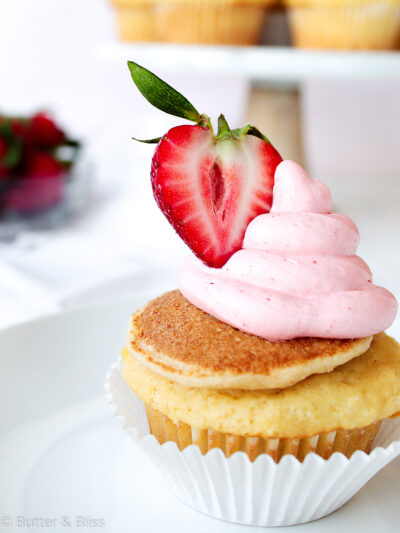 Single maple strawberry cupcake on a plate