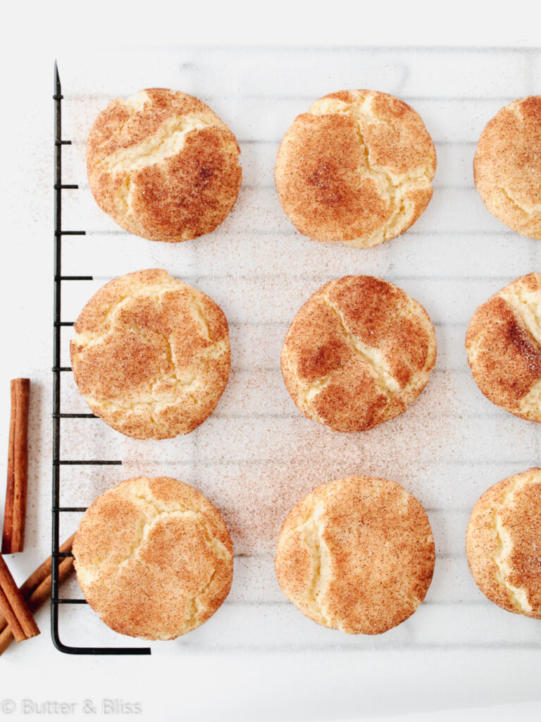 Snickerdoodle cookies on a cooling rack