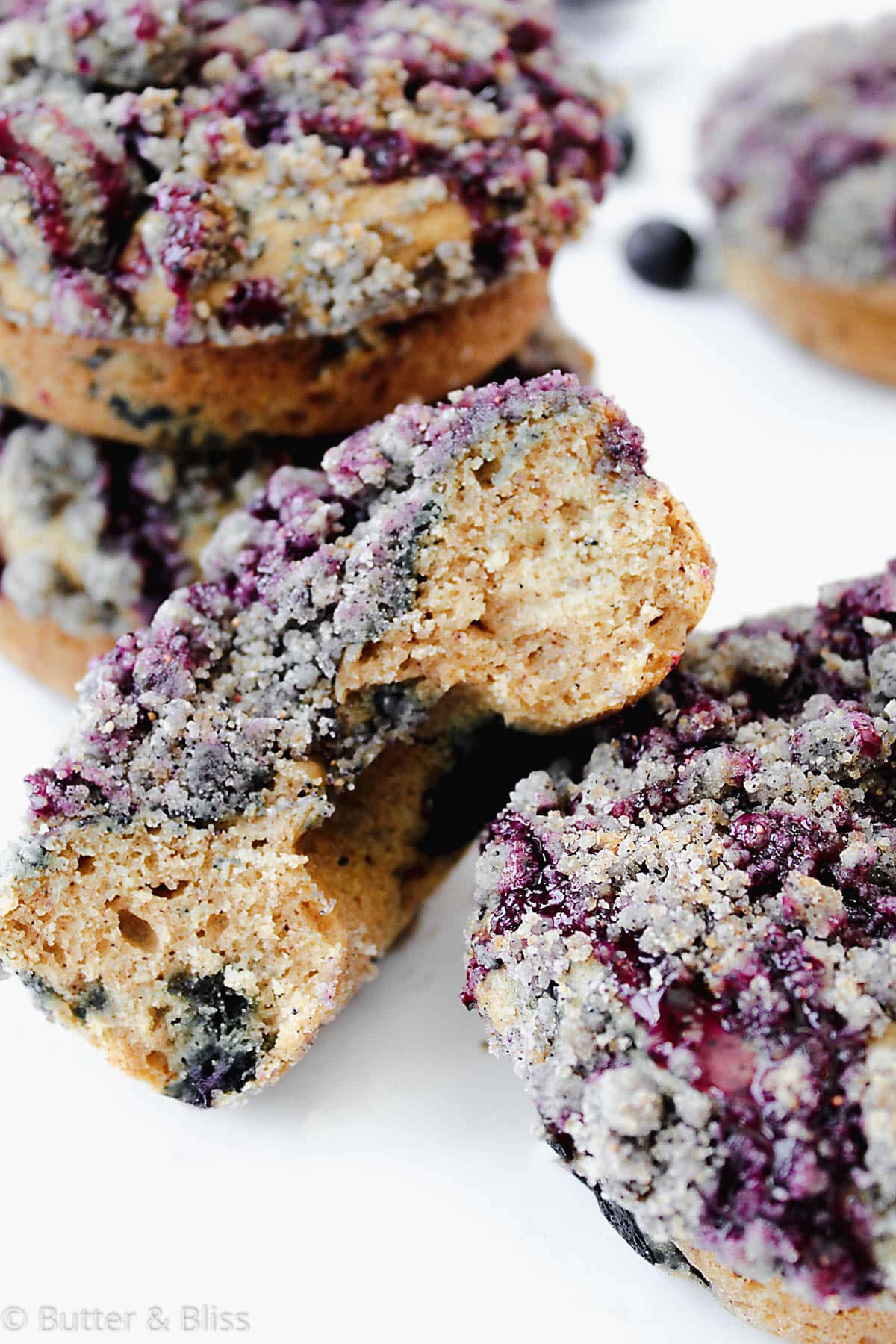 Blueberry streusel donut cut in half