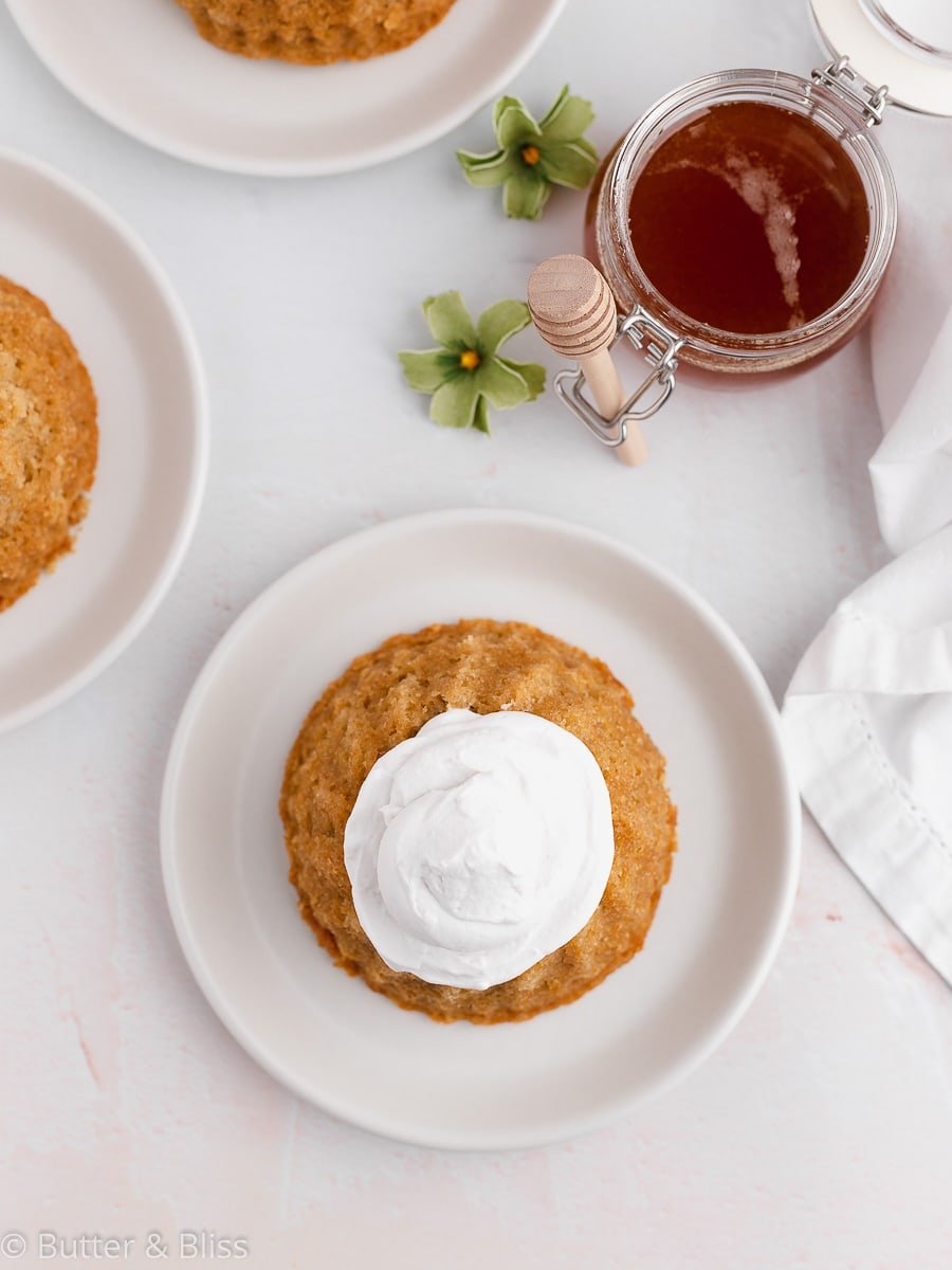 Top of a mini cake with whipped cream