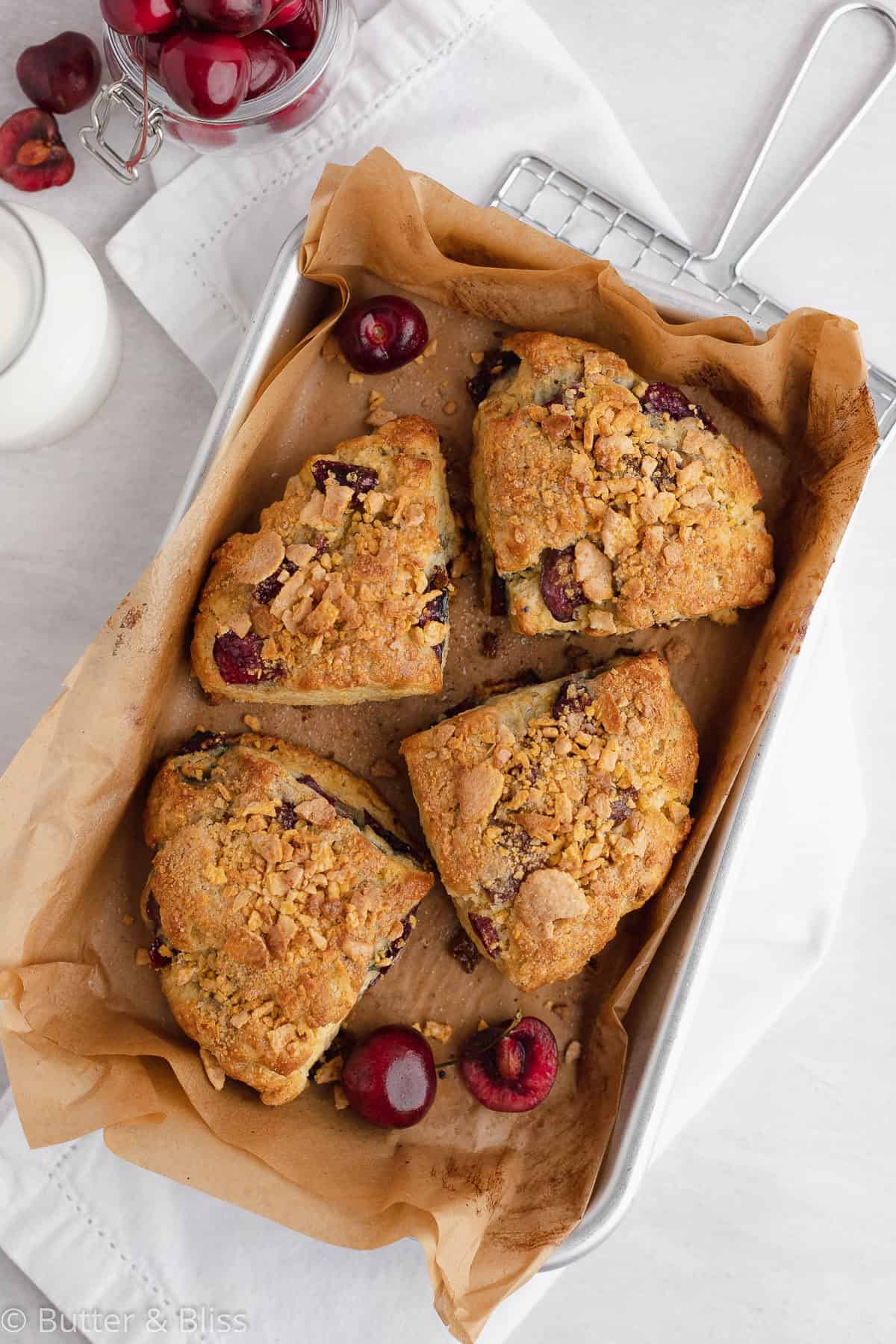 Cherry scones on a baking sheet