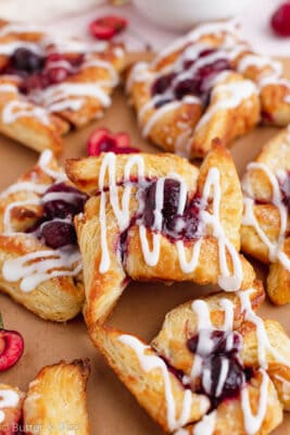 A plate of cherry pinwheel danish pastry