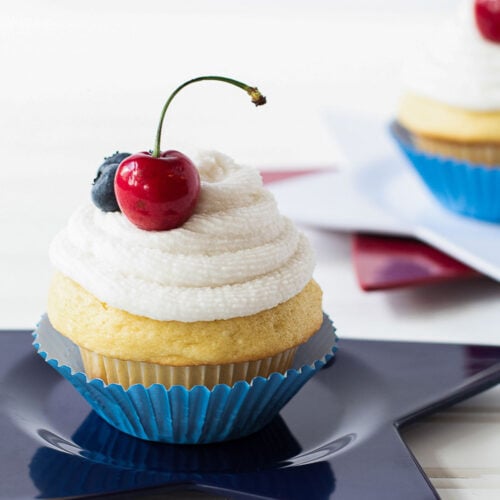 Frosted vanilla cupcake on a star plate for fourth of july