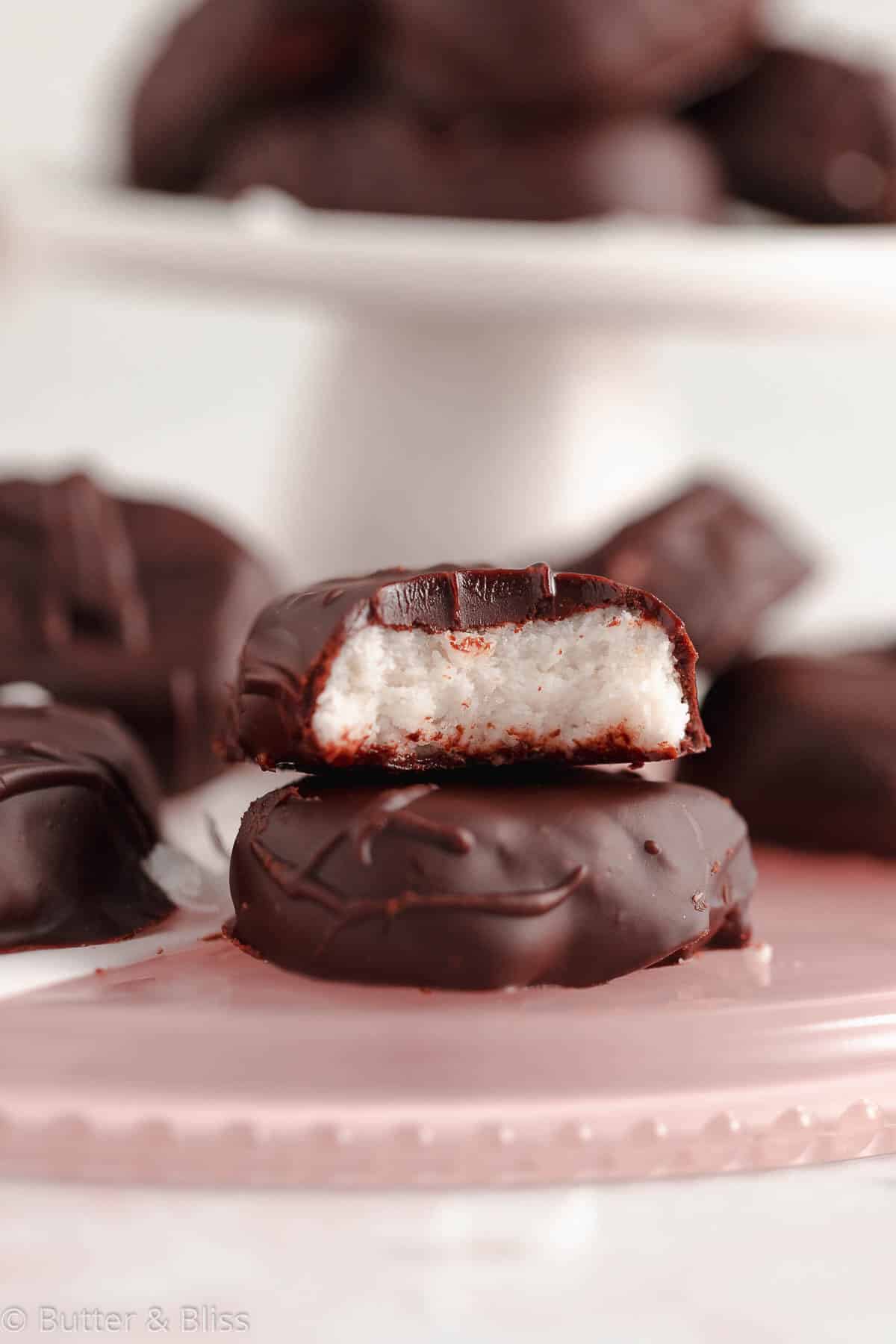 Two coconut cream candies in a stack
