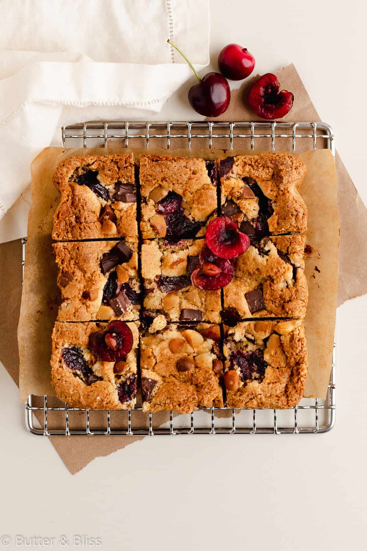 Small batch of blondies cut into squares on a wire rack