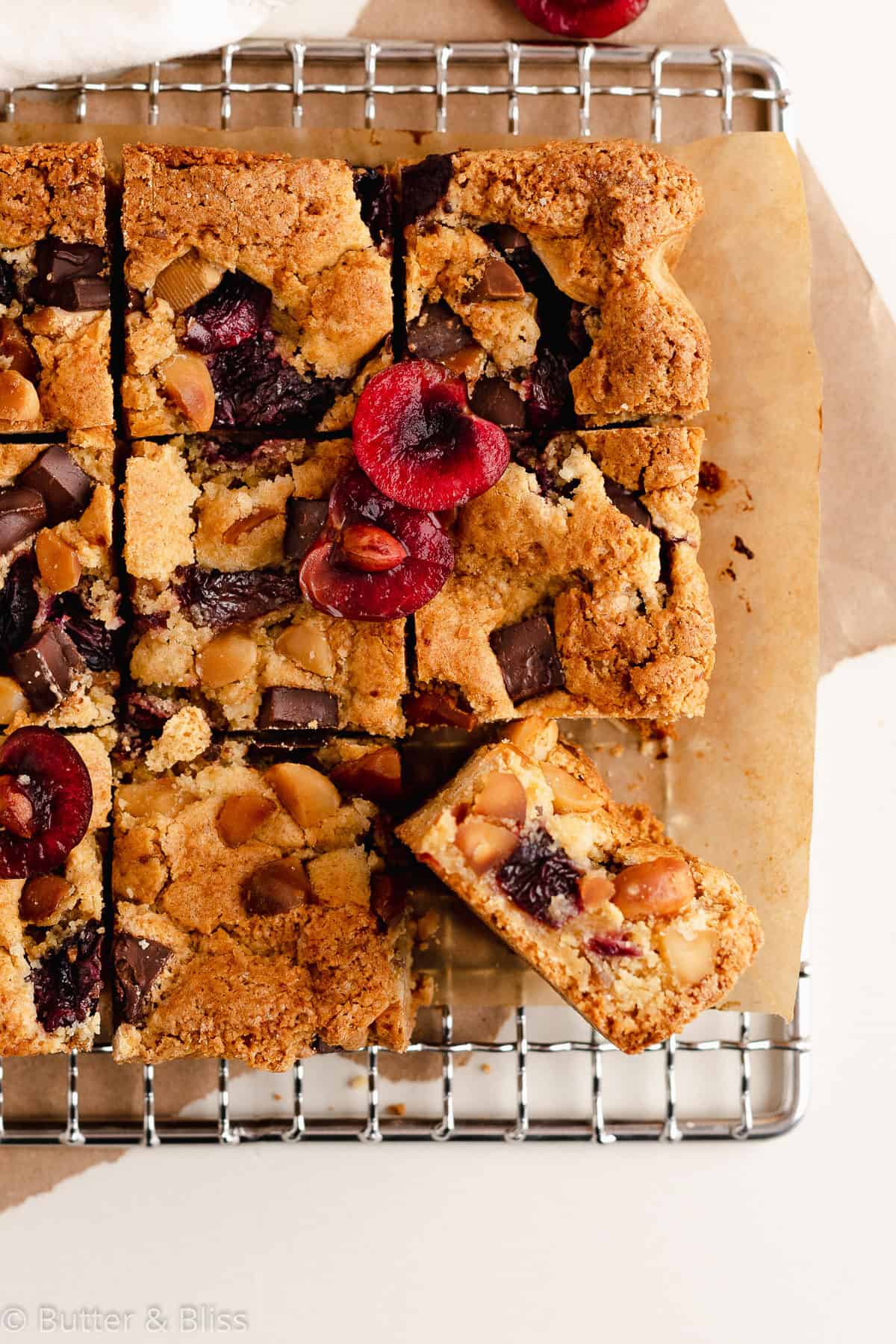 Close up of the inside of a cherry macadamia blondie