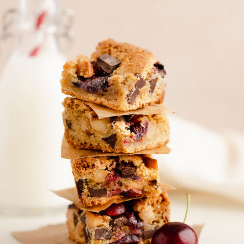 A stack of macadamia nut and cherry gluten free blondies