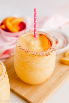 Single peach and citrus refresher with sugar tajin rim