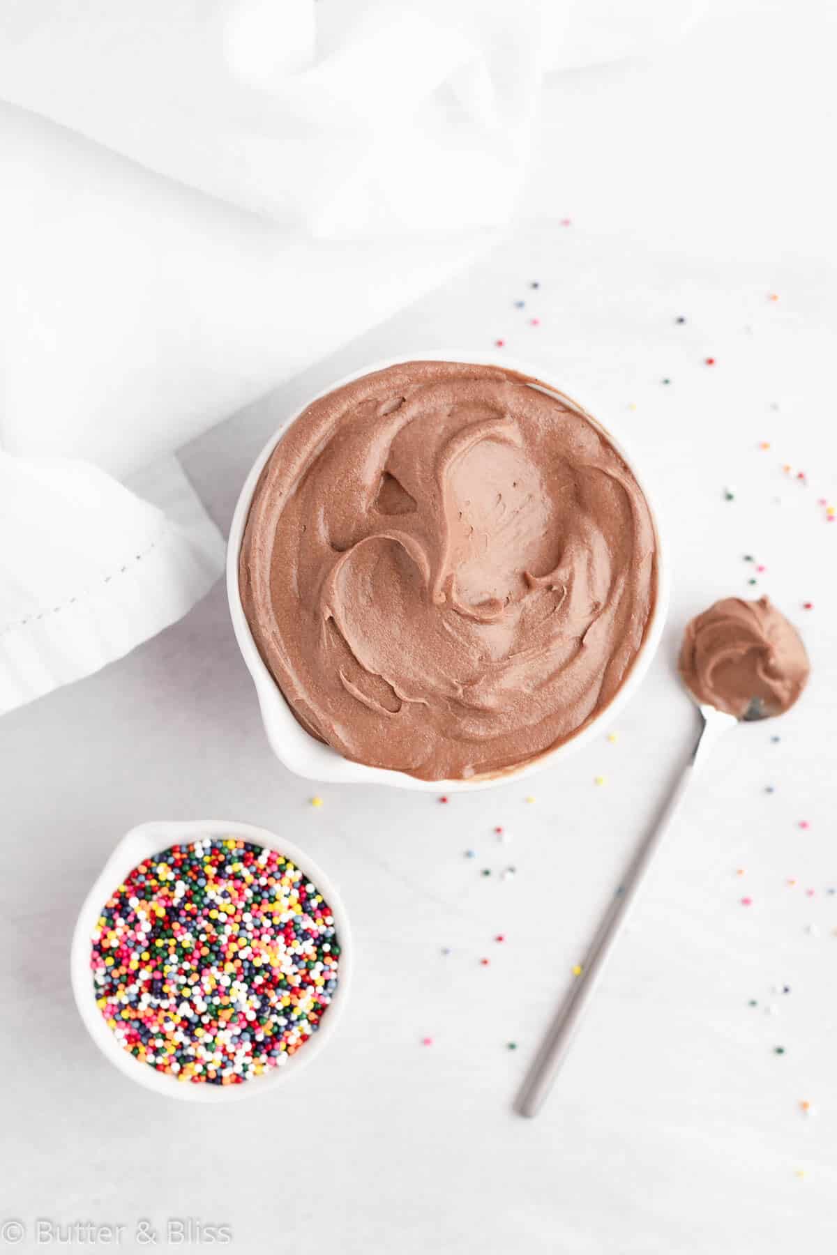 Chocolate dairy free frosting made with coconut milk in a bowl