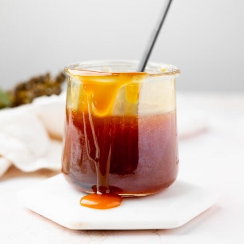 Maple syrup caramel sauce in a small jar