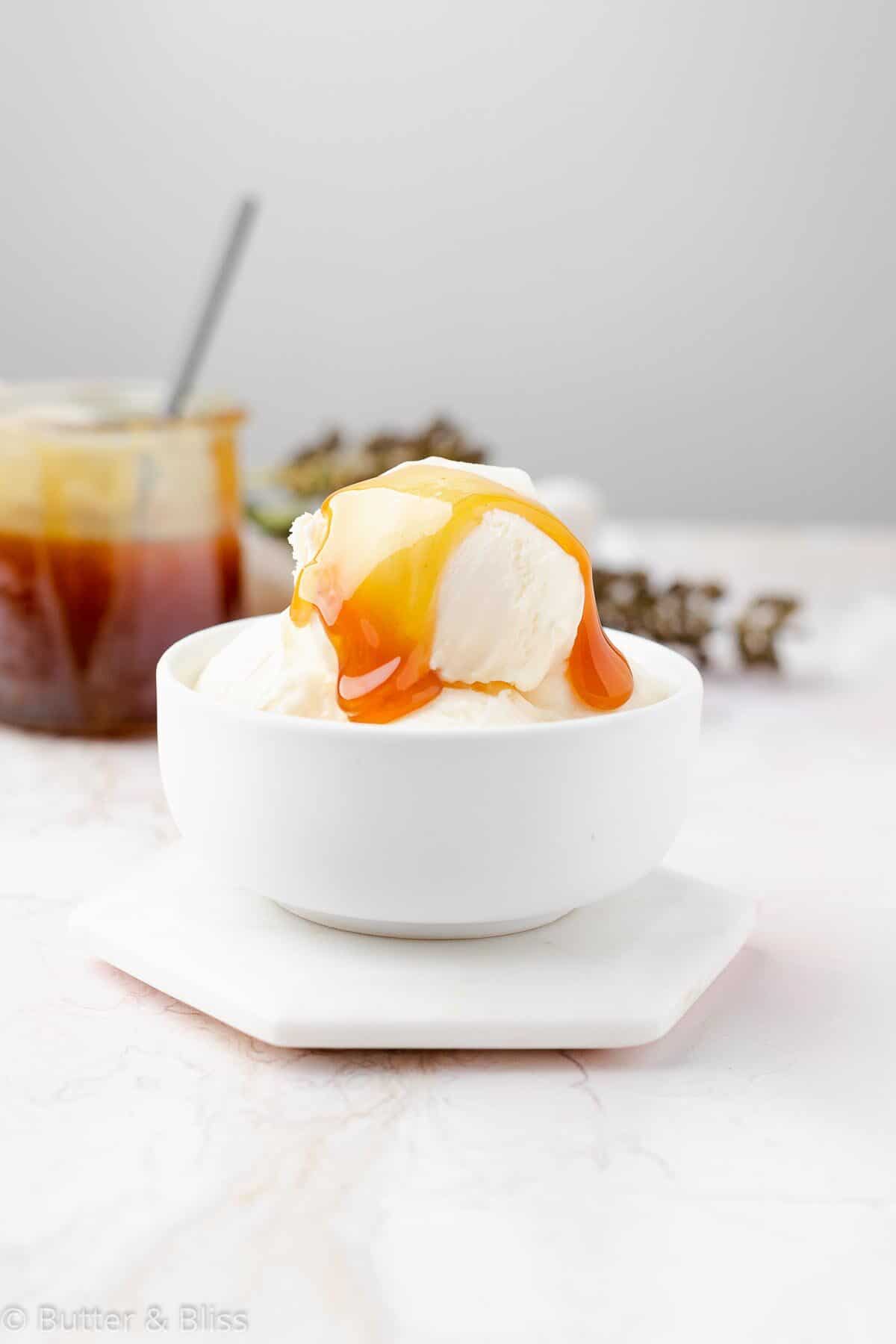 Maple syrup caramel sauce drizzled over ice cream