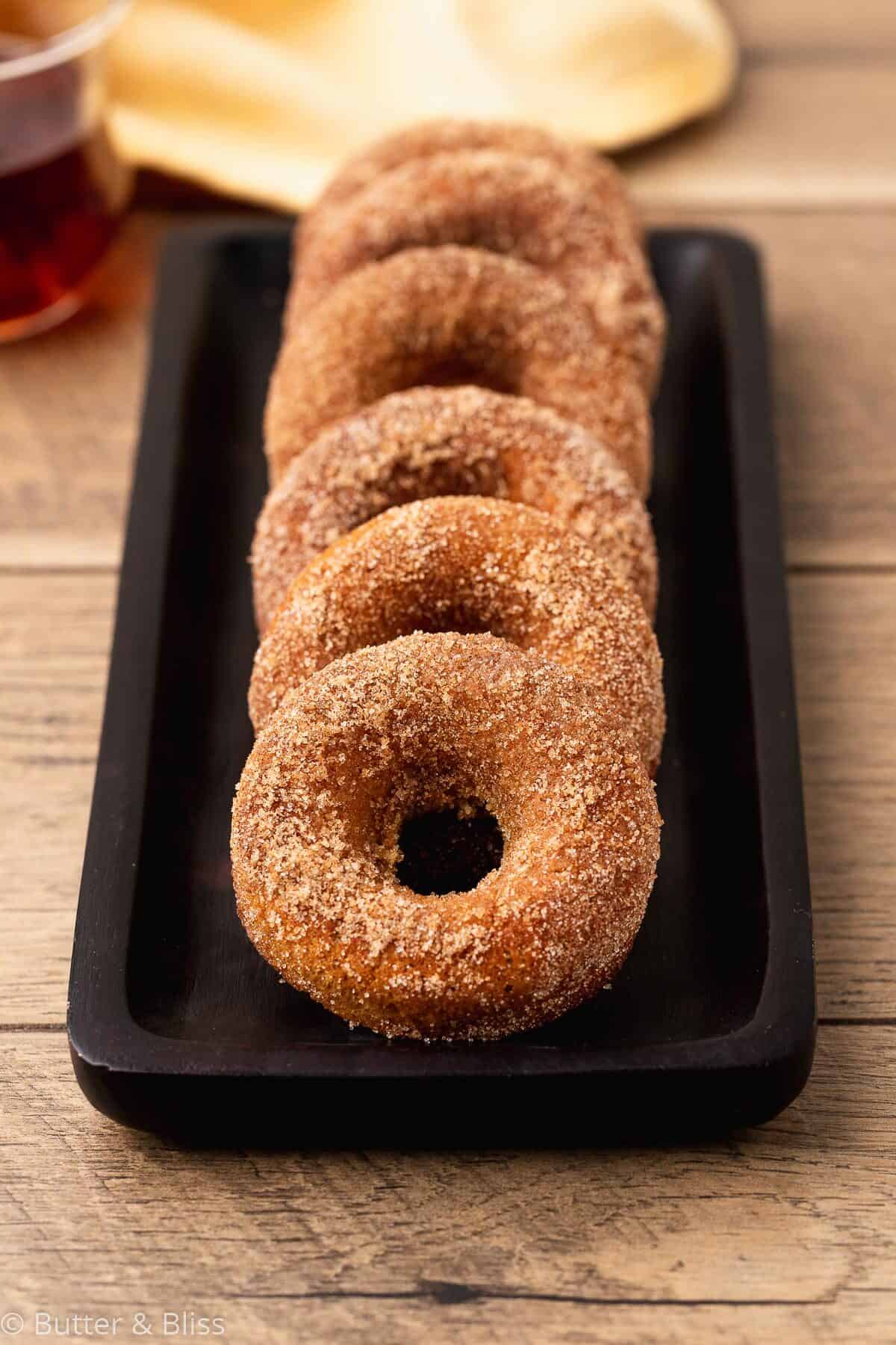 A small tray of gluten free apple cider donuts