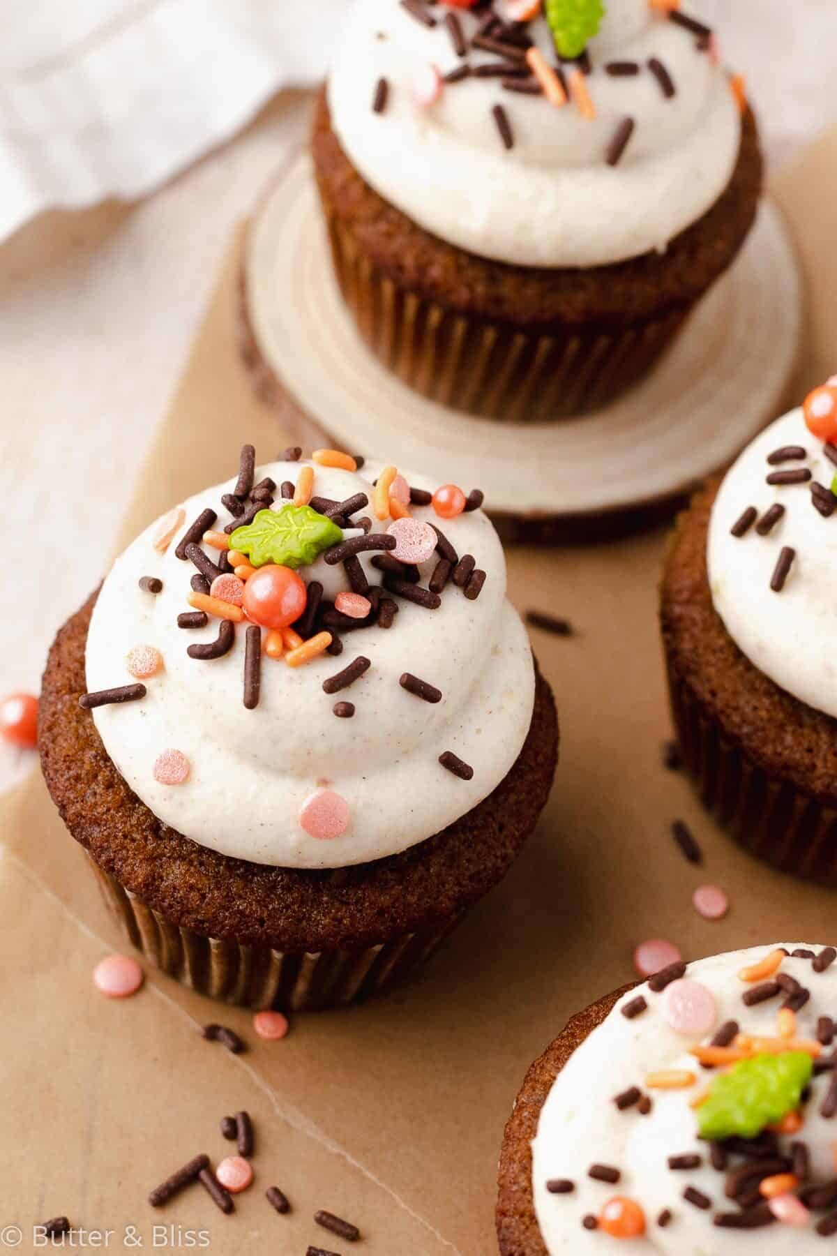 Gluten free spice cupcakes arranged on parchment paper