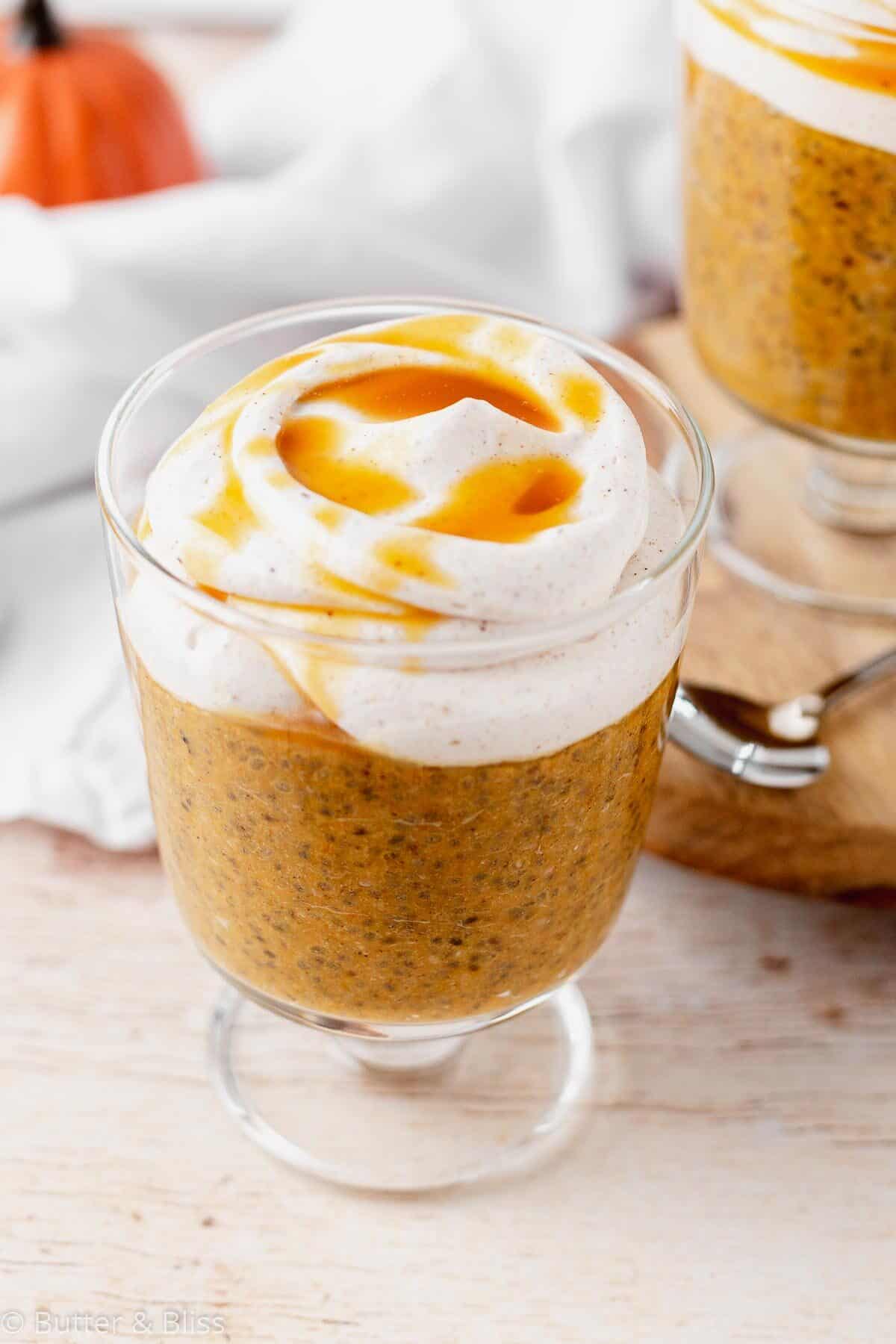 Pumpkin pie chia pudding close up with whipped cream