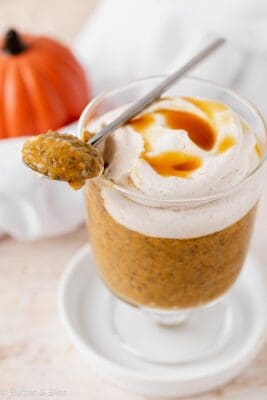 Chia seed pudding in a serving glass with whipped cream