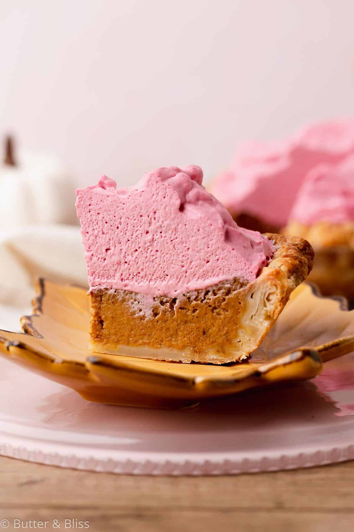 Perfect slice of mini pumpkin pie on a festive holiday plate