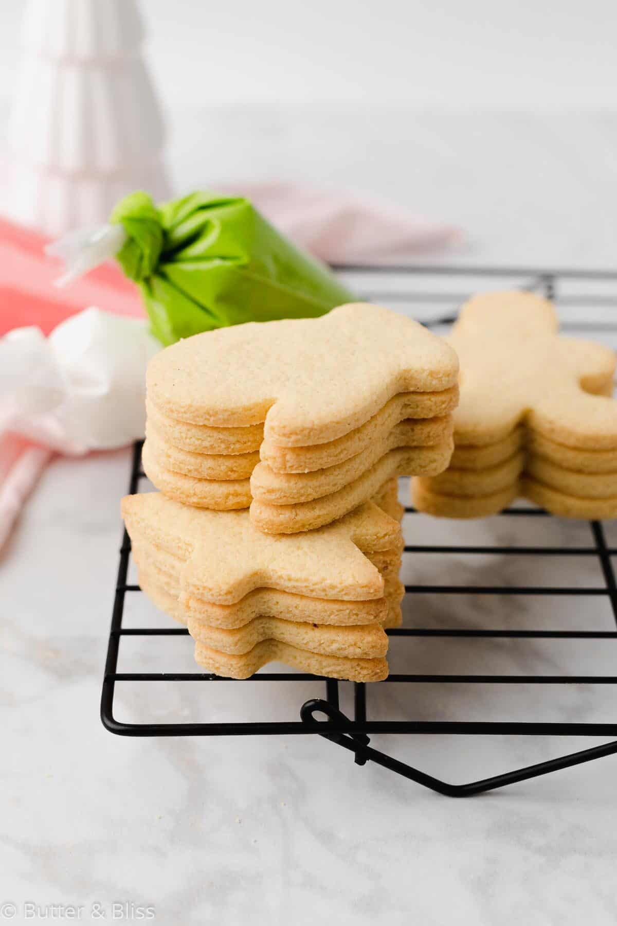 Stack of fresh baked gluten free sugar cookies on a wire rack