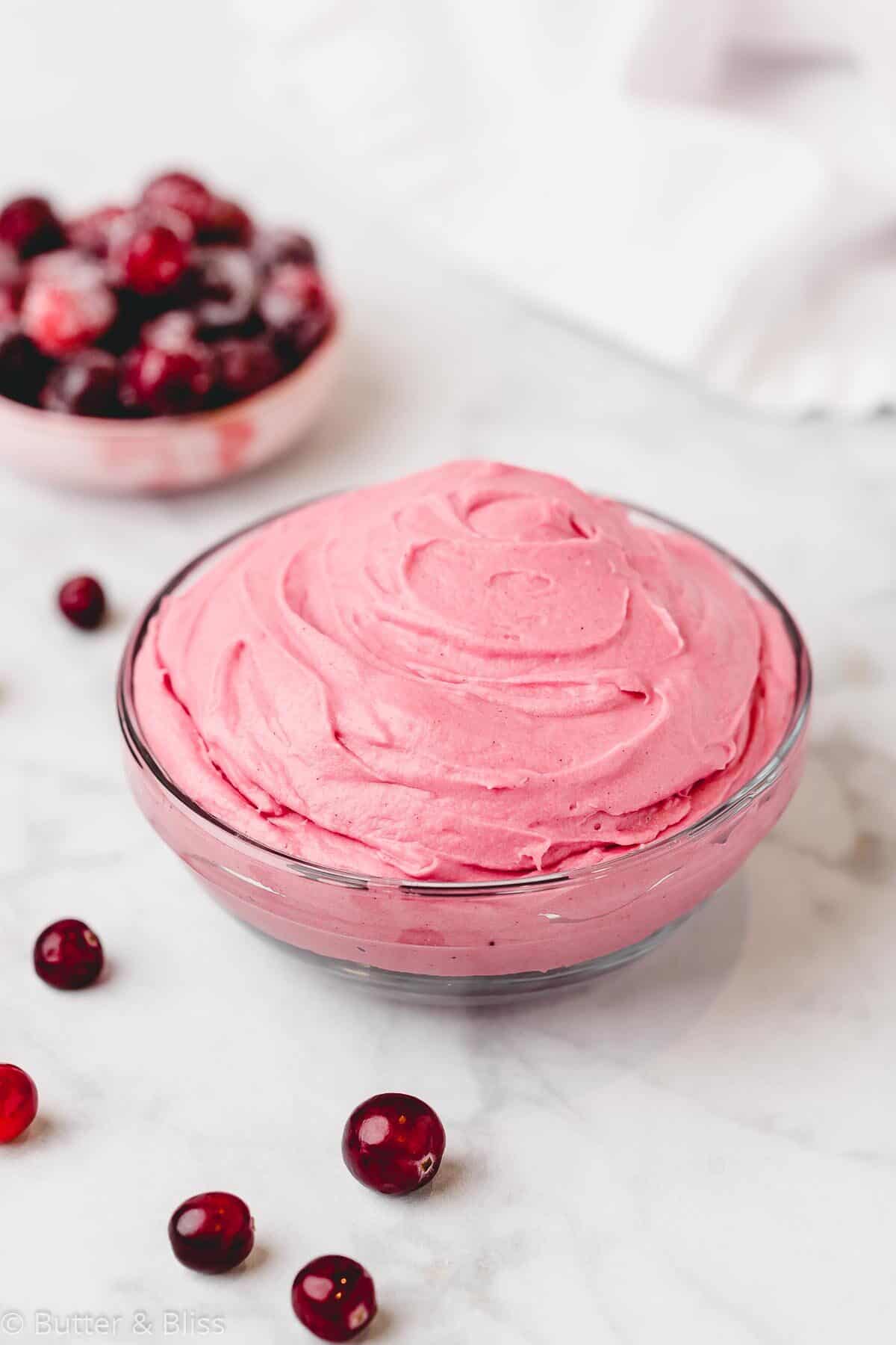 Bowl of cranberry cream cheese frosting