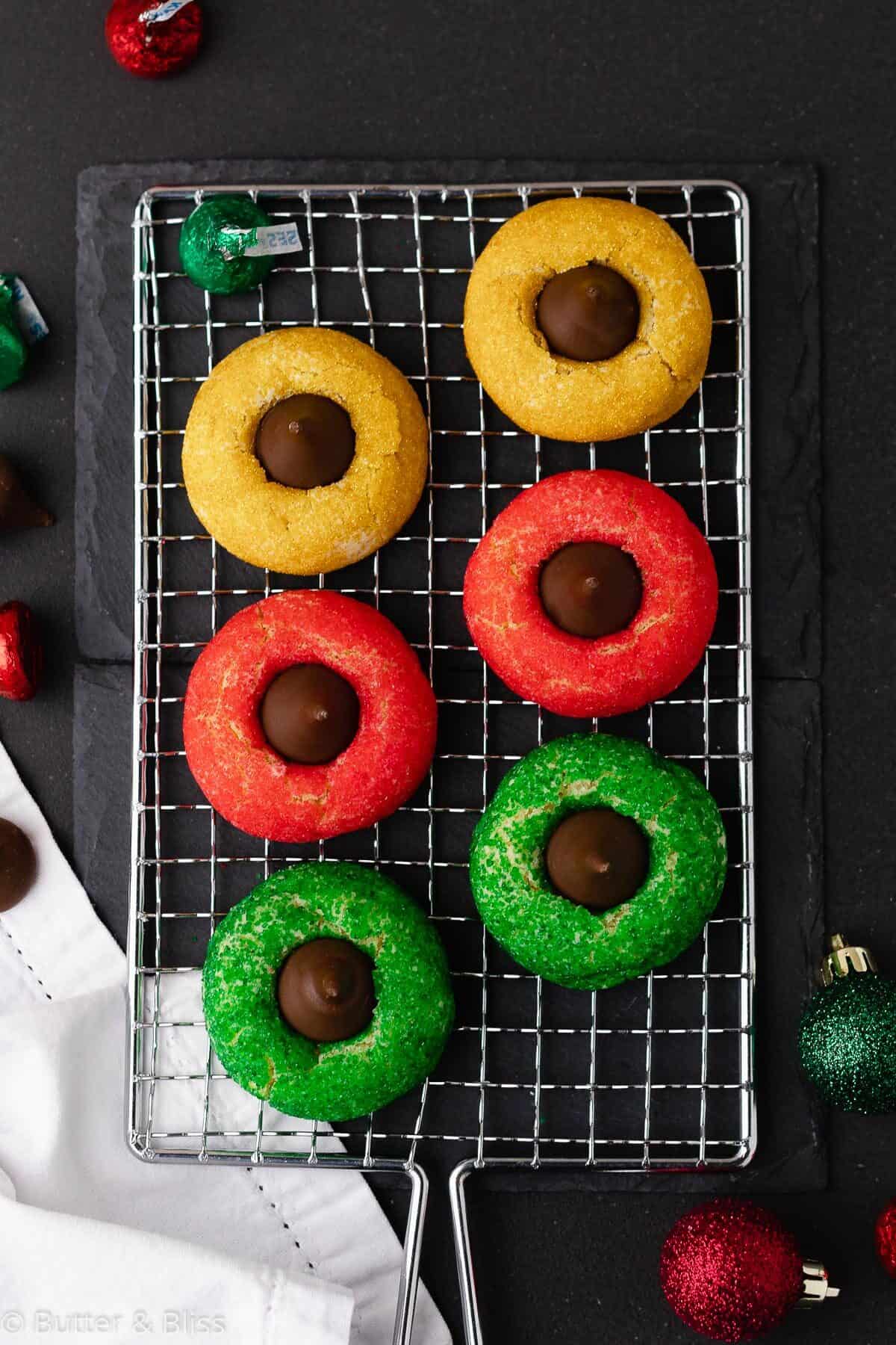 Christmas cookies with colored sparkles on a rack