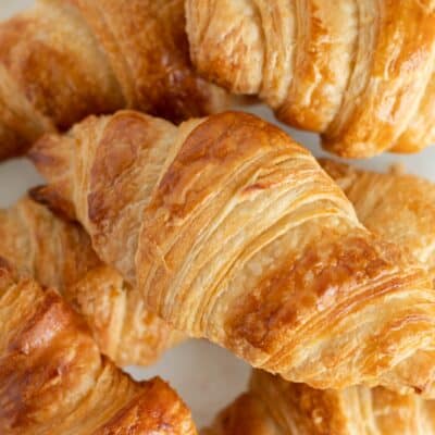 Extreme close up of a croissant and the flaky layers.