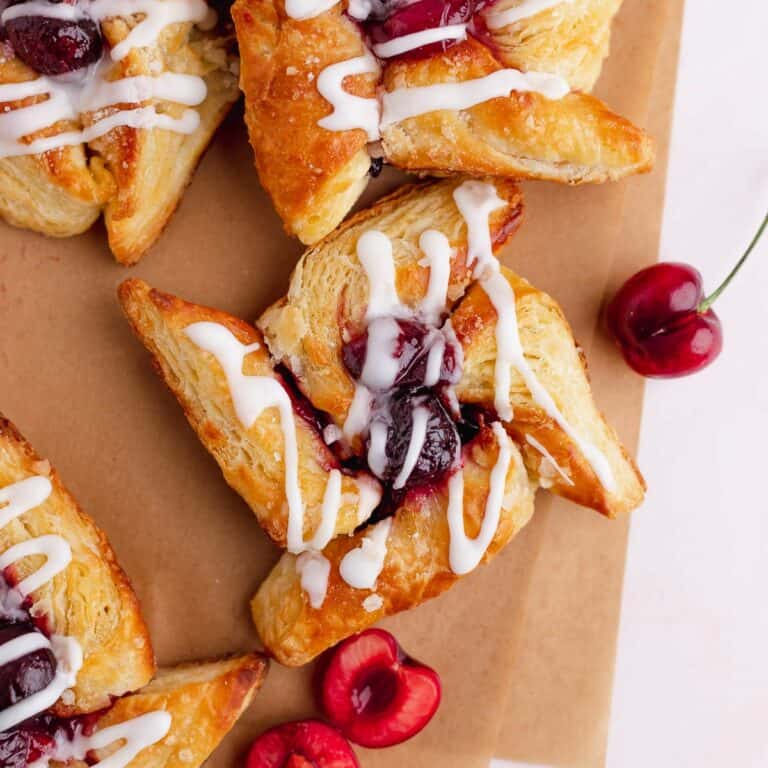 Close up on a cherry filled pinwheel danish pastry