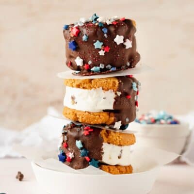 Stack of peanut butter ice cream sandwiches set on a table