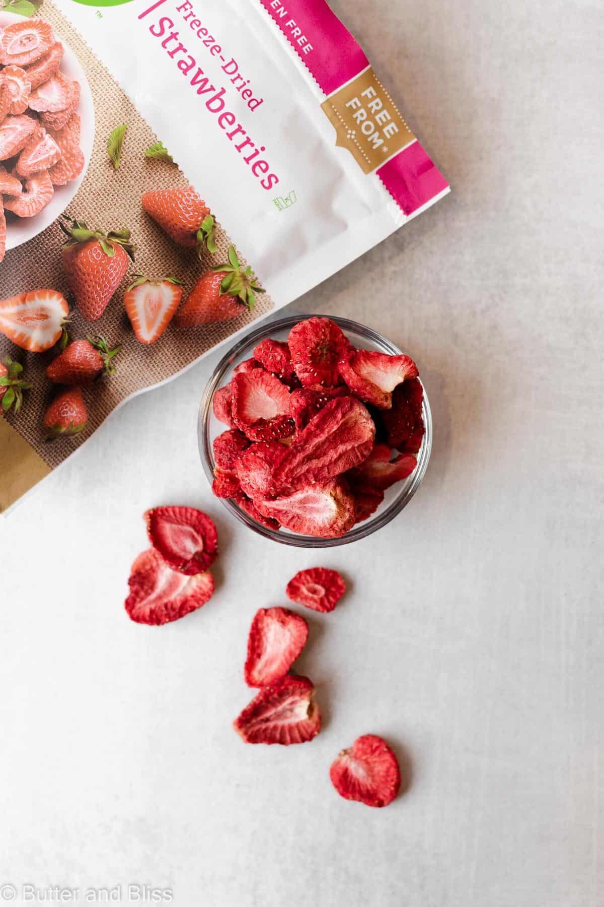 Freeze dried strawberries in a small bowl on a table