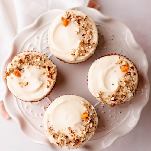 Top view of cream cheese frosted carrot cake gluten free cupcakes
