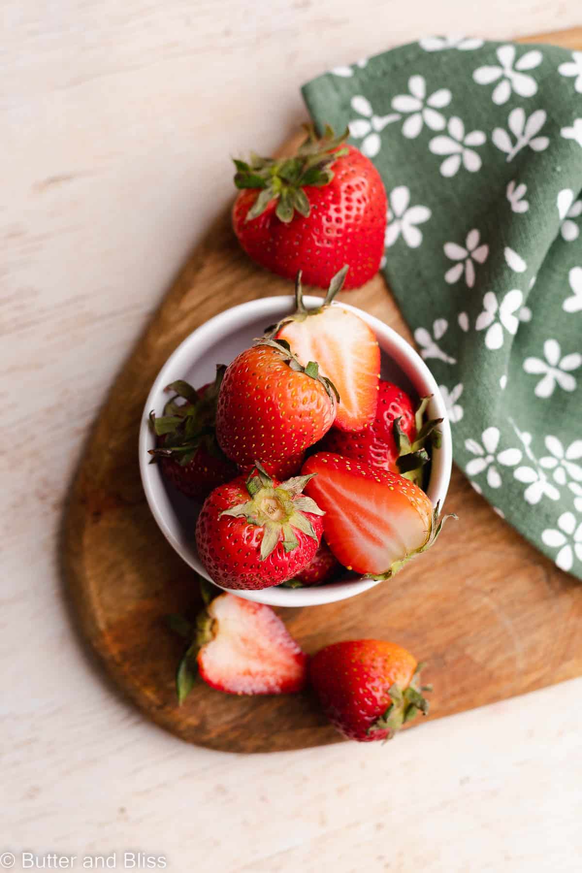 Fresh strawberries in a bowl on a table