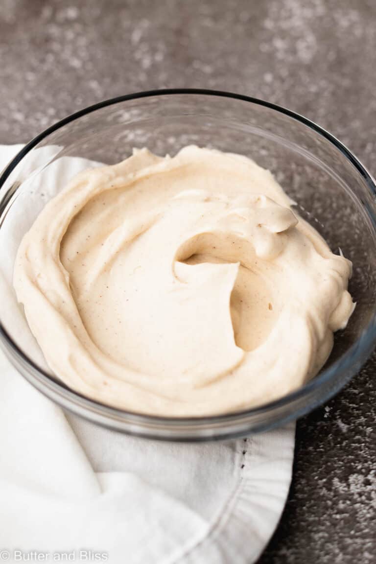 A bowl of cinnamon maple cream cheese frosting.
