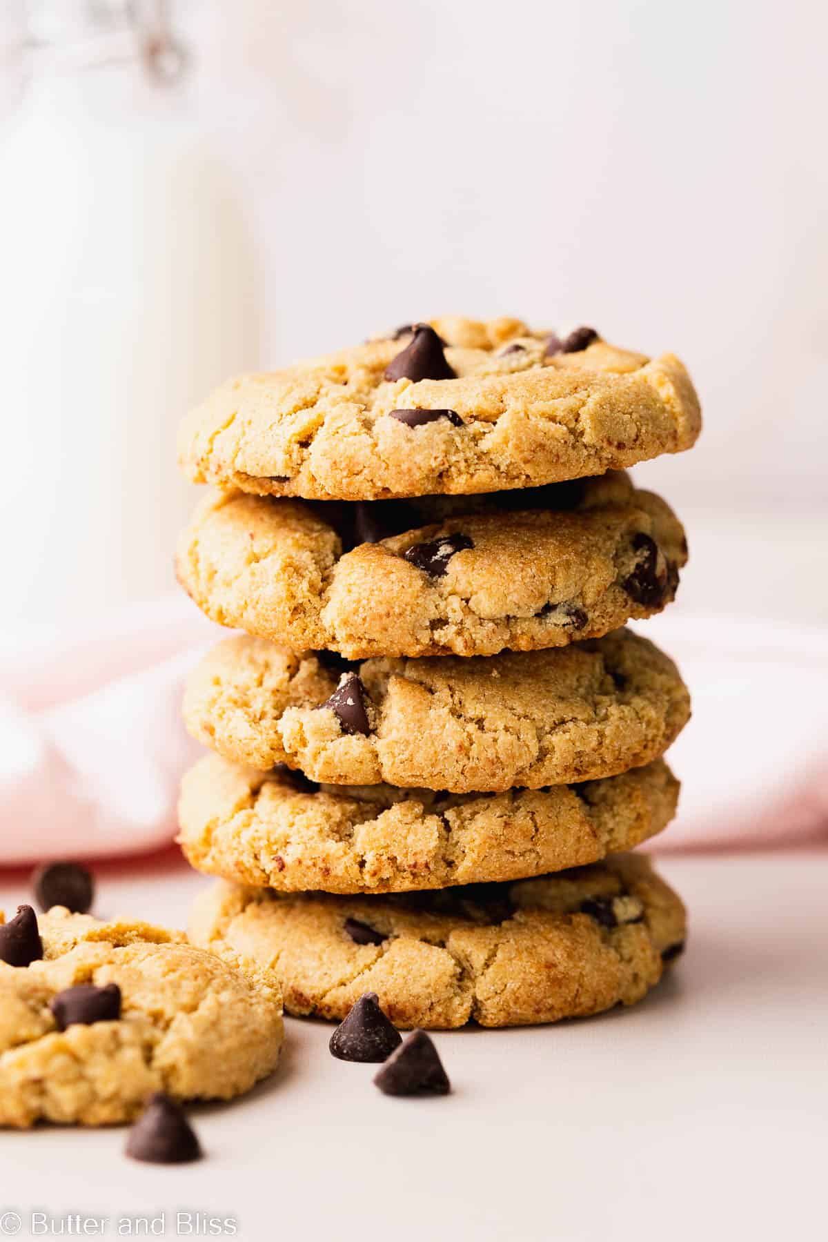 A stack of thick and chewy gluten free chocolate chip cookies.