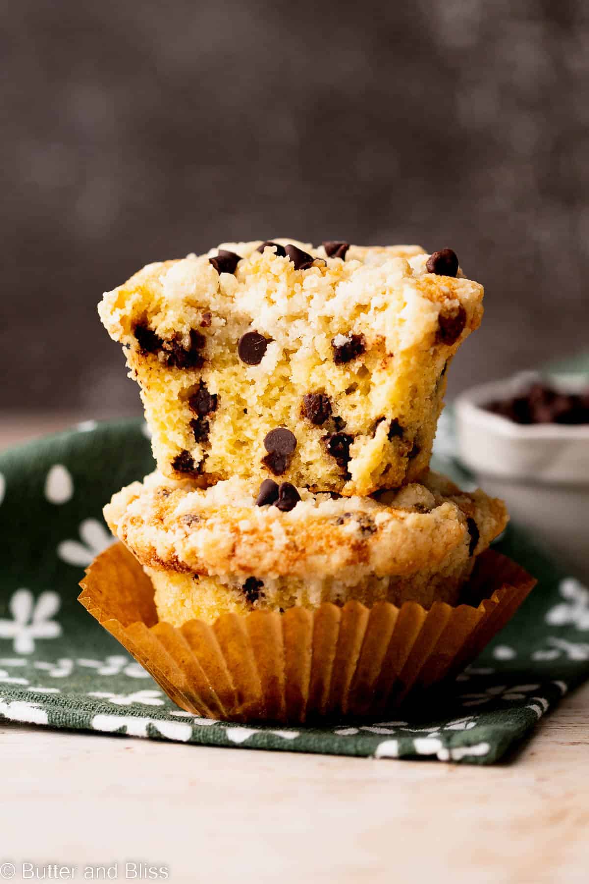 Soft inside of a chocolate chip gluten free muffins dotted with tons of chocolate chips.