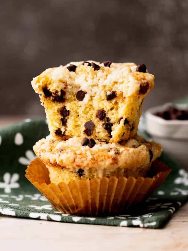 Soft inside of a chocolate chip gluten free muffins dotted with tons of chocolate chips.