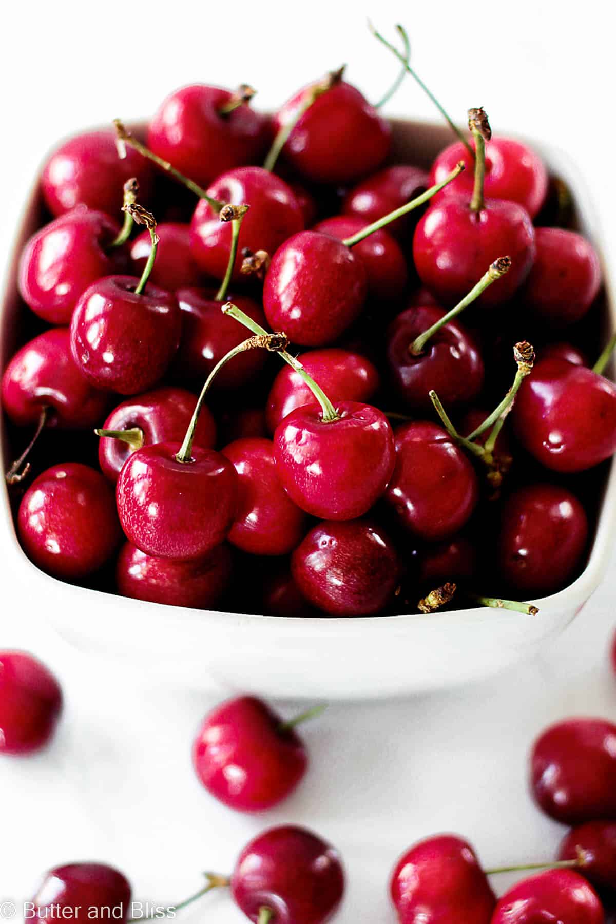 Sweet bowl of ruby red cherries.