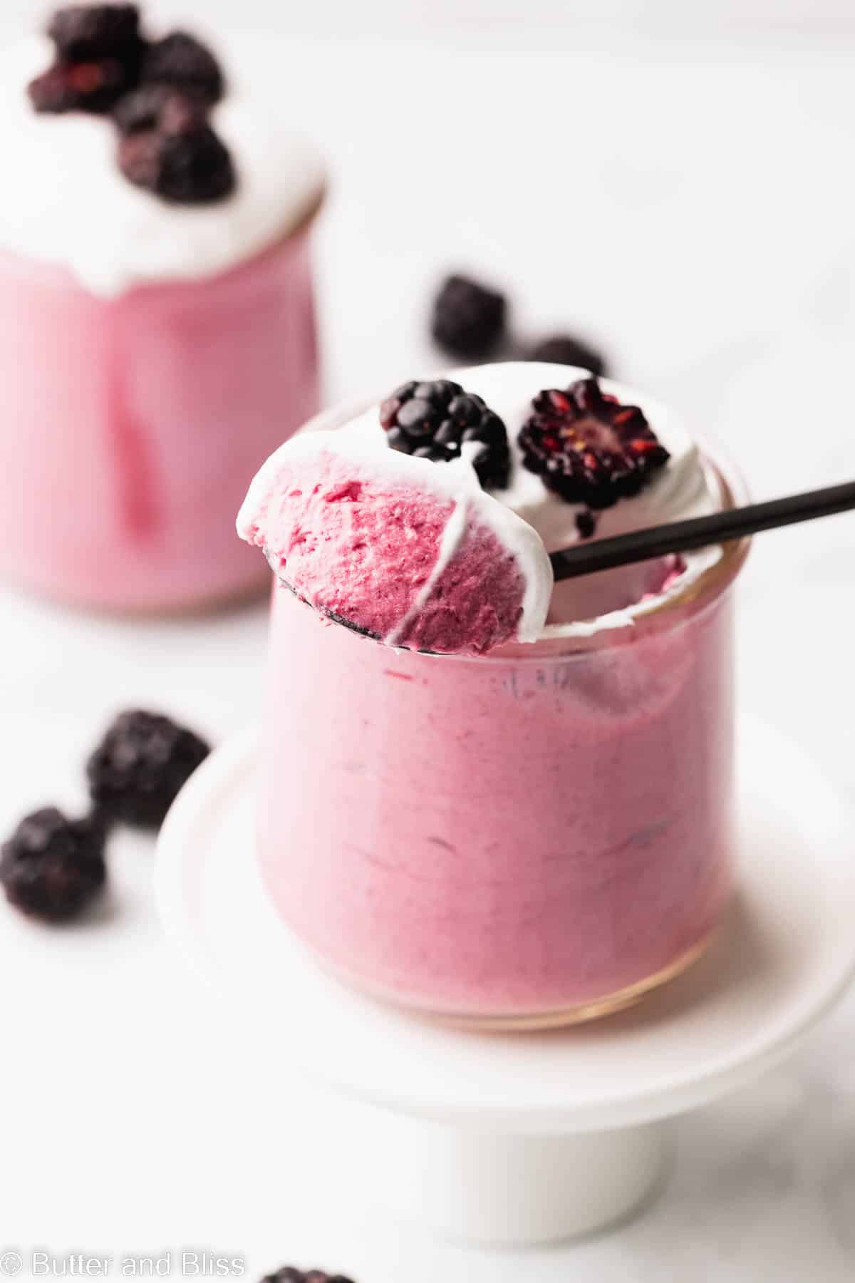 A spoonful of ultra creamy blackberry mousse.