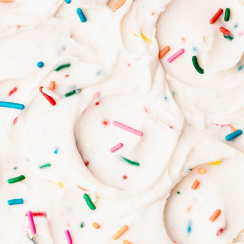 The creamiest close up of butter free funfetti frosting.