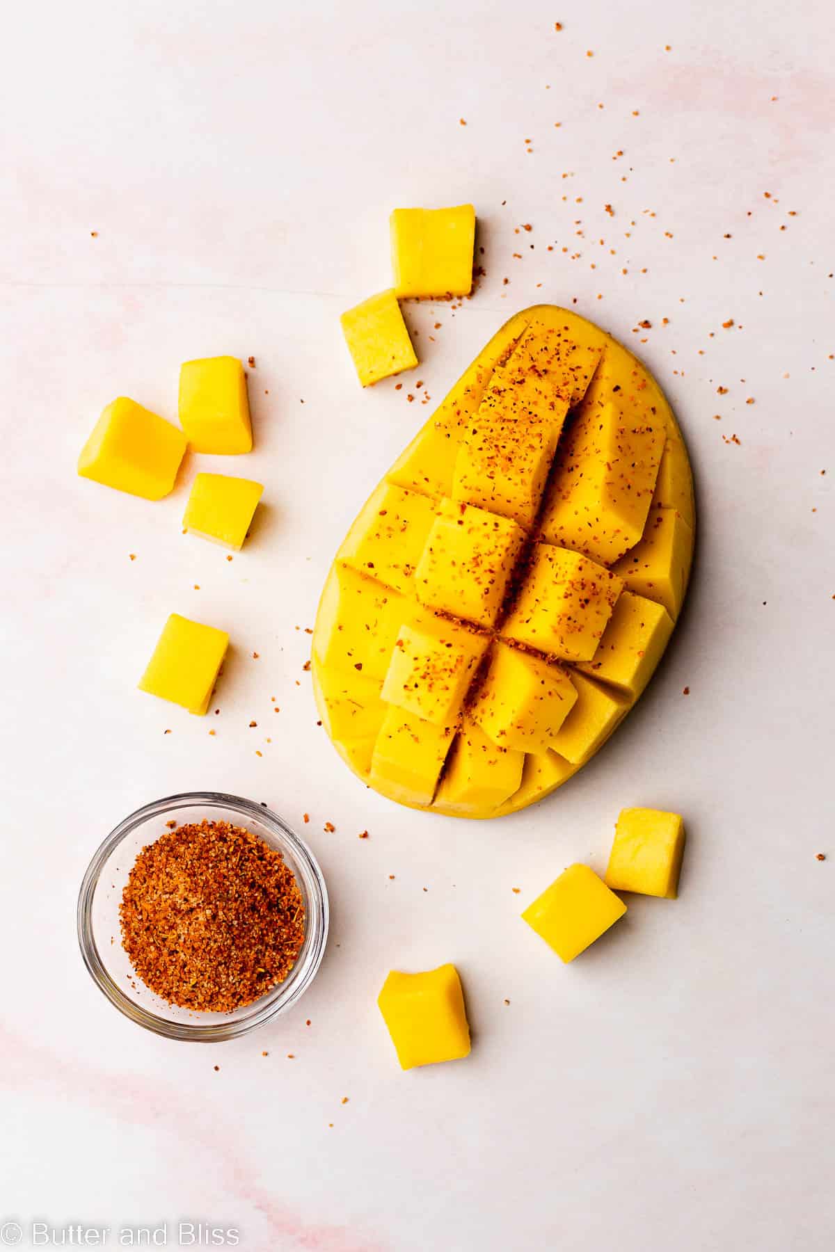 Fresh mango cubed and sprinkled with Tajin.