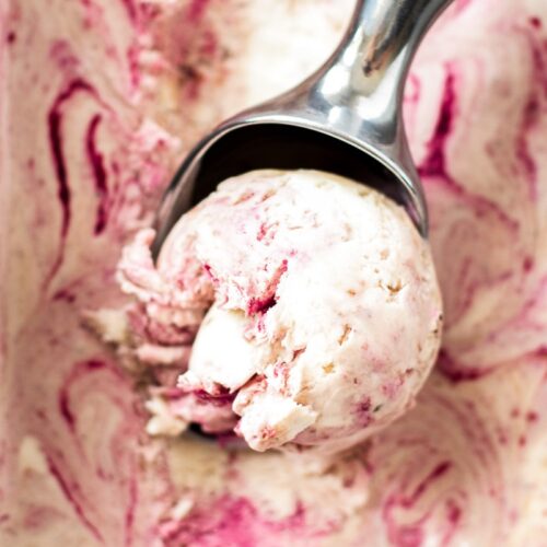 A delicious scoop of no churn chocolate cherry ice cream.