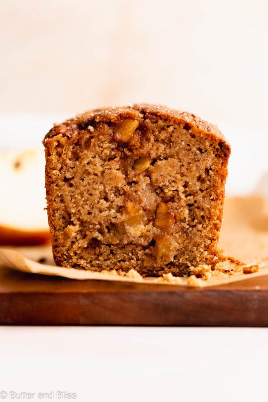 View of cut gluten free apple spice bread full of caramelized apples.
