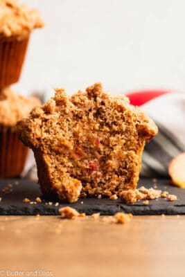 Delicious inside of an apple gluten free muffin dotted with apple chunks.